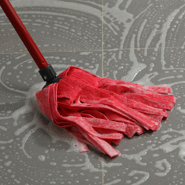 Mopping the floor tiles Mopping the floor tiles | Dehart Tile